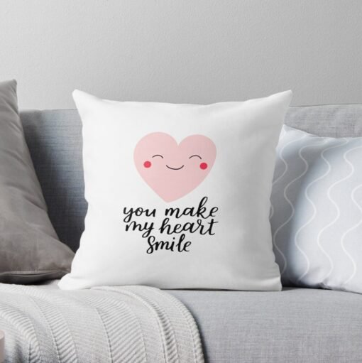 White throw pillow with love texts