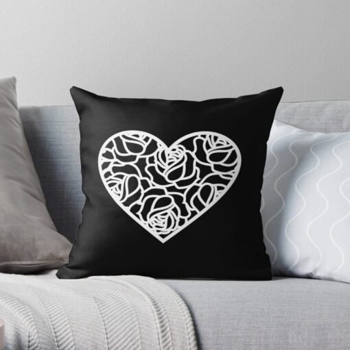 Black throw pillow with heart design