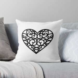 White throw pillow with heart design